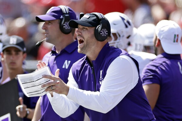 Rutgers rolls Northwestern 24 7 as Wildcats play 1st game since